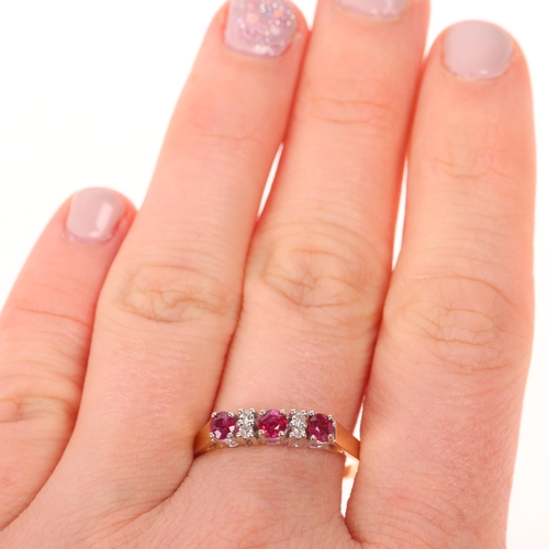 1427 - An 18ct gold ruby and diamond half hoop ring, maker DM, import London 1978, setting height 3.7mm, si... 