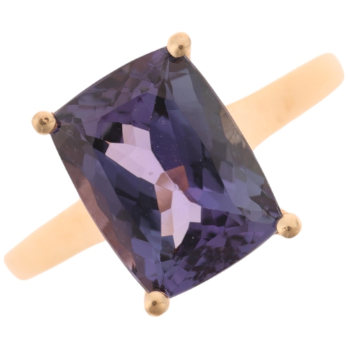 1429 - A 9ct gold single stone tanzanite dress ring, maker R&C, set with rectangular cushion-cut tanzanite,... 