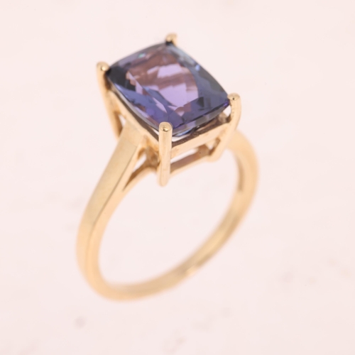 1429 - A 9ct gold single stone tanzanite dress ring, maker R&C, set with rectangular cushion-cut tanzanite,... 