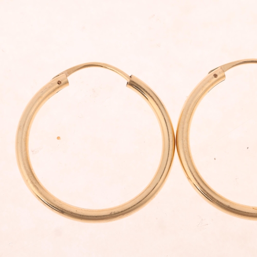 1446 - A pair of Continental 9ct gold hoop earrings, unmarked mount tests as 9ct, 30.5mm, 2.8g