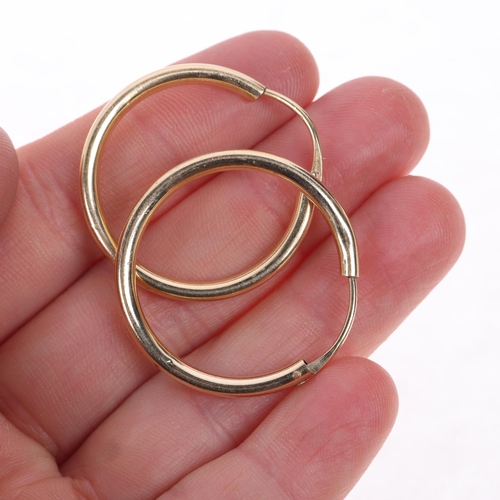 1446 - A pair of Continental 9ct gold hoop earrings, unmarked mount tests as 9ct, 30.5mm, 2.8g