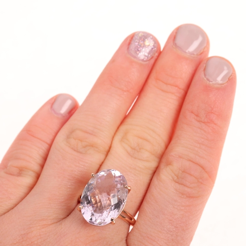 1463 - A 9ct rose gold pink kunzite dress ring, set with oval rose-cut kunzite, setting height 18mm, size N... 