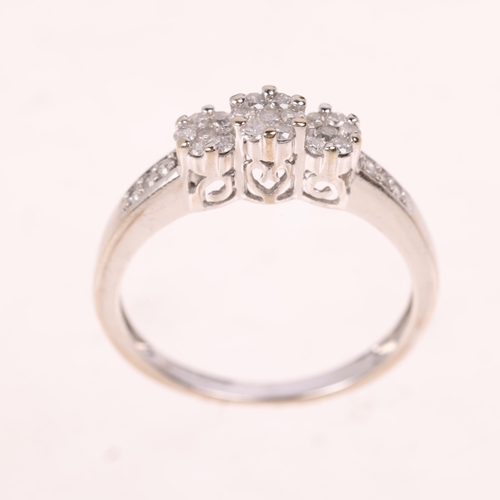 1482 - A modern 9ct white gold diamond triple flowerhead cluster ring, set with modern round brilliant-cut ... 