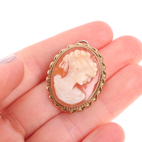 1490 - A 9ct gold shell cameo brooch/pendant, maker EJ Ltd, Birmingham 1972, relief carved depicting female... 