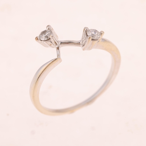 1495 - A 14ct white gold two stone diamond wishbone ring, set with modern round brilliant-cut diamonds, tot... 