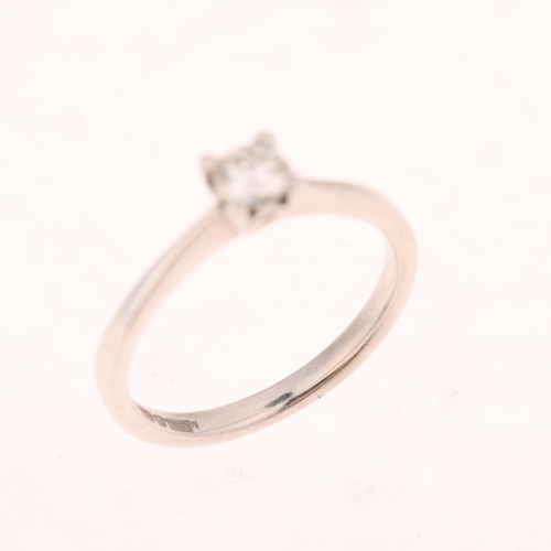 1498 - An 18ct white gold 0.25ct single stone diamond ring, maker B&N, claw set with modern round brilliant... 