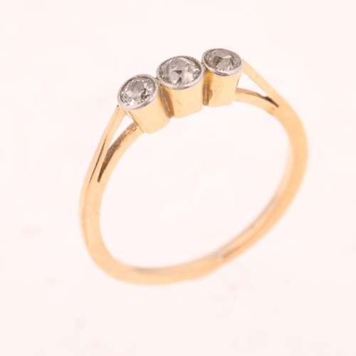 1499 - An 18ct gold three stone diamond ring, millegrain set with old-cut diamonds, total diamond content a... 