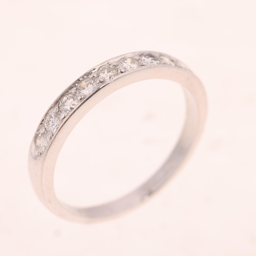 1500 - An 18ct white gold diamond half eternity ring, indistinct maker, London 1995, pave set with modern r... 