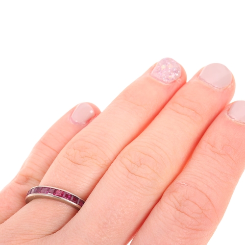 1505 - An Art Deco 18ct white gold ruby half eternity band ring, channel set with calibre-cut rubies, band ... 