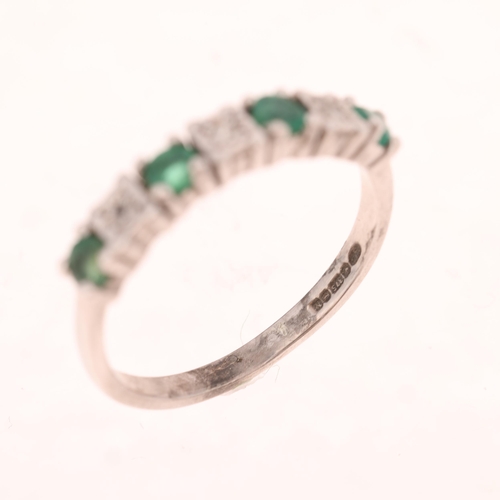 1509 - A 9ct white gold emerald and diamond half hoop ring, maker GJ, Birmingham 1987, set with round-cut e... 