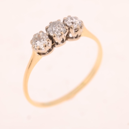 1519 - An 18ct gold three stone diamond ring, claw set with old European-cut diamonds, total diamond conten... 