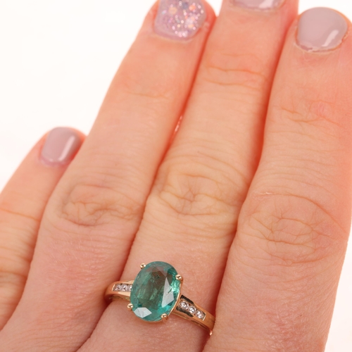 1522 - A 14ct gold emerald and diamond dress ring, set with oval mixed-cut emerald and modern round brillia... 