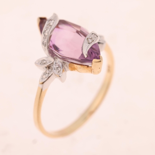 1525 - A 9ct gold amethyst and diamond dress ring, maker JAH, import London 1991, set with marquise-cut ame... 