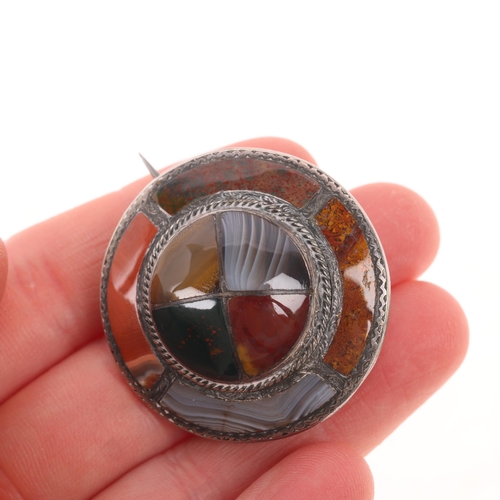 1559 - A 19th century Scottish hardstone shield brooch, unmarked silver set with banded agate bloodstone ja... 