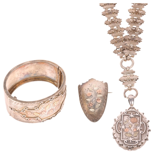 1562 - An Antique Victorian silver and two-colour gold jewellery set, comprising locket pendant necklace, h... 