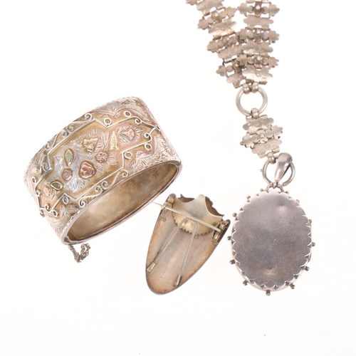 1562 - An Antique Victorian silver and two-colour gold jewellery set, comprising locket pendant necklace, h... 