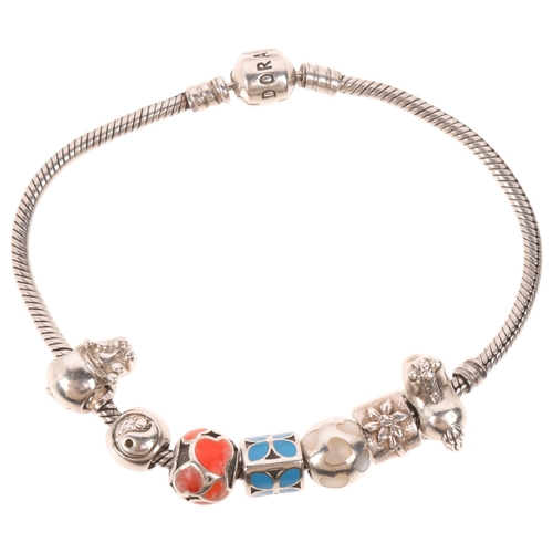 1578 - PANDORA - a sterling silver snake link charm bracelet, with 7 silver charms, 21cm, 40.7g