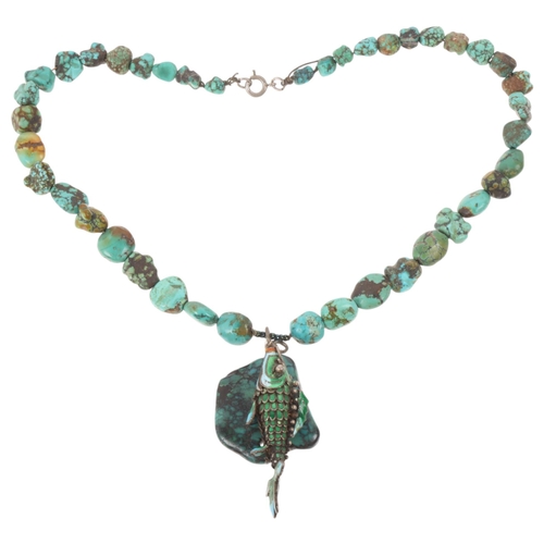 1589 - A single-strand graduated turquoise matrix bead necklace, with enamel articulated fish pendant, 36cm... 