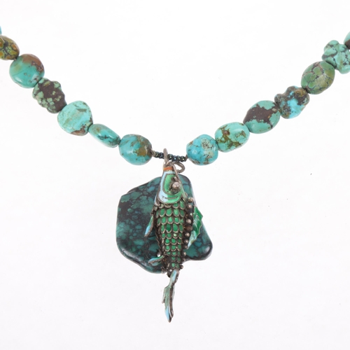 1589 - A single-strand graduated turquoise matrix bead necklace, with enamel articulated fish pendant, 36cm... 