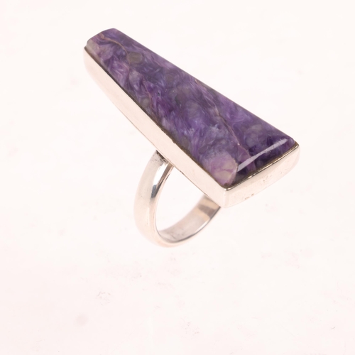 1602 - A modern sterling silver charoite dress ring, setting height 36.9mm, size R, 10.9g