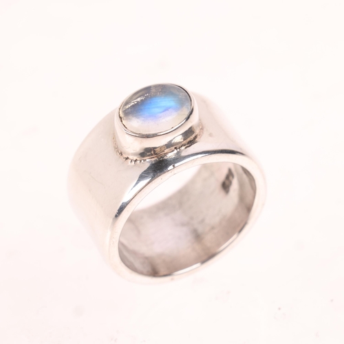 1604 - A modern sterling silver moonstone band ring, band width 11.4mm, size M, 14.2g