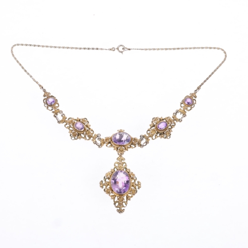 1606 - A Continental silver-gilt amethyst Renaissance Revival pendant necklace, each graduated panel set wi... 