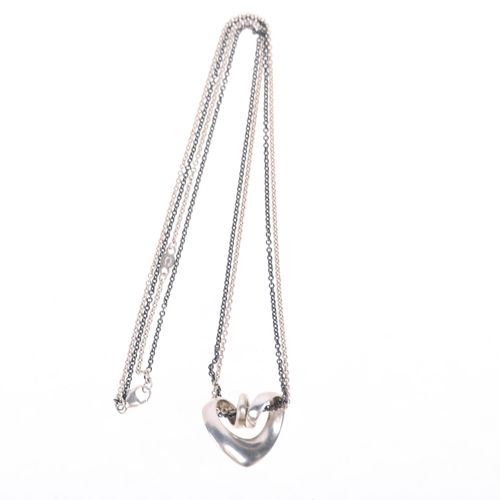 1607 - GEORG JENSEN - a Danish modernist sterling silver Pendant of the Year 2001 heart necklace, on origin... 