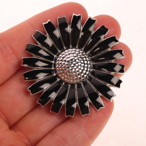 1610 - GEORG JENSEN - a Danish modernist sterling silver black enamel daisy pattern matching brooch and stu... 