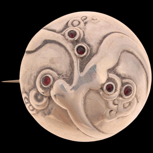 1615 - MOGENS BALLIN (Copenhagen, 1871 - 1914) - an Art Nouveau Danish silver garnet bombe brooch, relief e... 