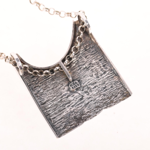 1622 - KNUD JORGENSEN RANDERS - a Danish brutalist oxidised sterling silver abstract pendant necklace, on s... 