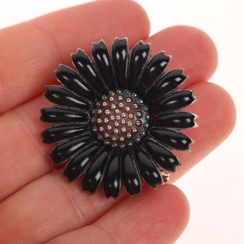 1627 - A Danish sterling silver black enamel daisy pattern brooch/pendant, indistinct maker, 32.5mm, 11g