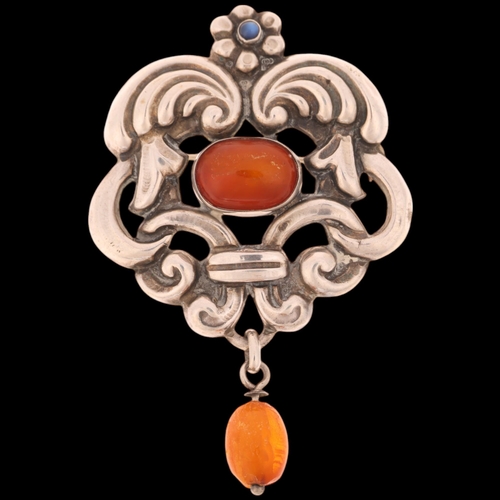 1633 - GEORG ALBERT H HALLING - a large Art Nouveau Danish silver amber and moonstone openwork brooch, pier... 