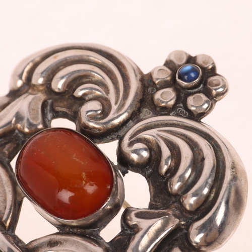 1633 - GEORG ALBERT H HALLING - a large Art Nouveau Danish silver amber and moonstone openwork brooch, pier... 