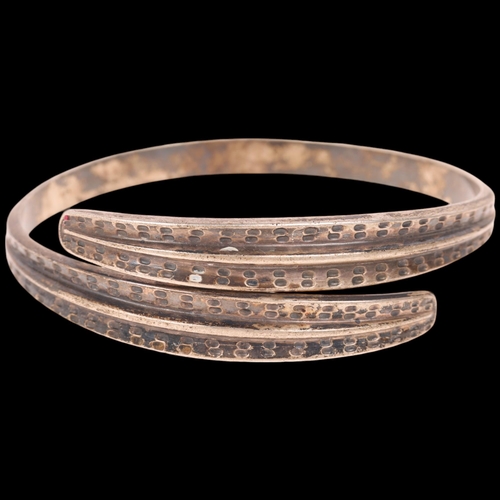 1634 - DAVID ANDERSEN - a Norwegian sterling silver Viking Revival torque bangle, a copy of original from y... 