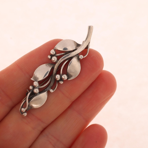 1648 - JUST ANDERSEN - an Art Nouveau style Danish sterling silver floral spray brooch, model no. 477, 50.8... 