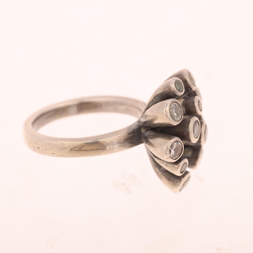 1657 - SCROUPLES - a Danish modernist sterling silver cubic zirconia abstract ring, setting height 19.4mm, ... 