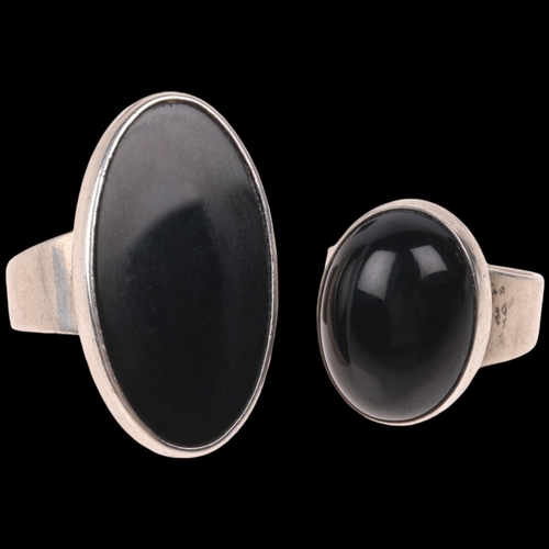 1676 - NIELS ERIK FROM - 2 Danish modernist sterling silver onyx rings, largest setting height 26.8mm, size... 