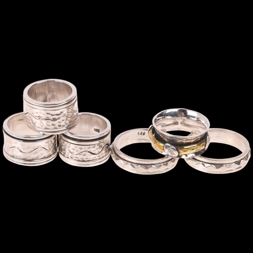 1682 - 6 modern silver twisting puzzle rings, sizes P x 2, R, T, and Z+ x 2, 77.4g total (6)