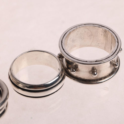 1683 - 4 modern sterling silver rings, sizes M x 2, N, and Q, 22.8g total (4)