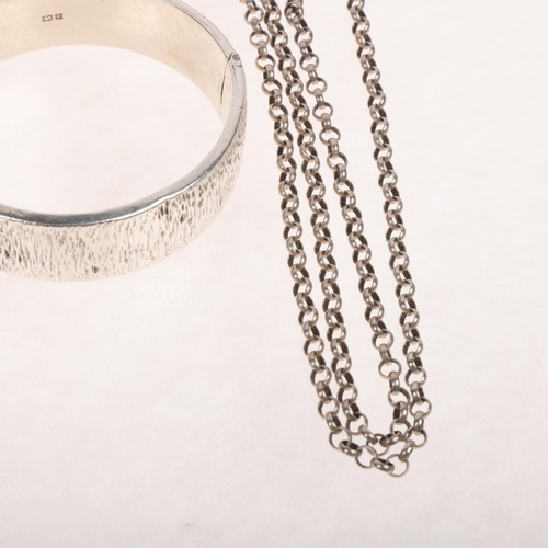 1690 - A silver hinged bangle, internal circumference 17cm, and a silver belcher link necklace, 50cm, 43g t... 