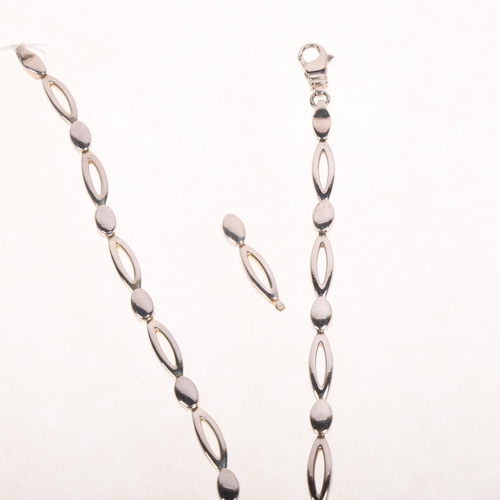 1693 - A sterling silver oval link chain necklace and bracelet set, necklace 42cm, bracelet 16cm, 44.2g tot... 