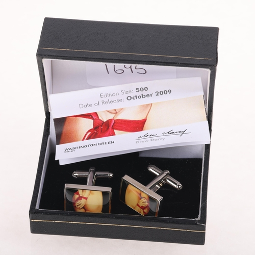 1695 - DREW DARCY - a pair of stainless steel 'Guilty Pleasures II' limited edition novelty cufflinks, 19.7... 