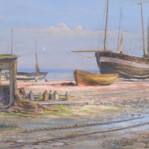 499 - Early 20th century oil on board, fishing boats on shore, indistinctly signed, 48cm x 39cm, framed