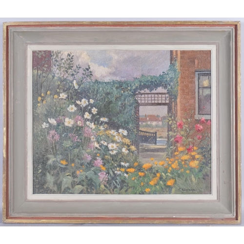 635 - C Ginner, flowers in garden, 20th century oil on board, signed, 53cm x 44cm, framed