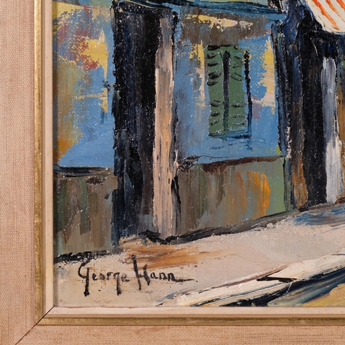 685 - George Hann, Parisian street scene, oil on canvas, 40cm x 75cm, framed