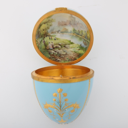 1750 - An Elizabeth II silver-gilt enamel egg box, maker WL, Birmingham 1985, the gilded duck egg blue enam... 