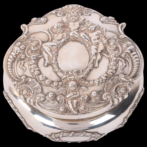 1755 - TIFFANY & CO - an American sterling silver dressing table box and cover, circa 1900, round bulbous f... 