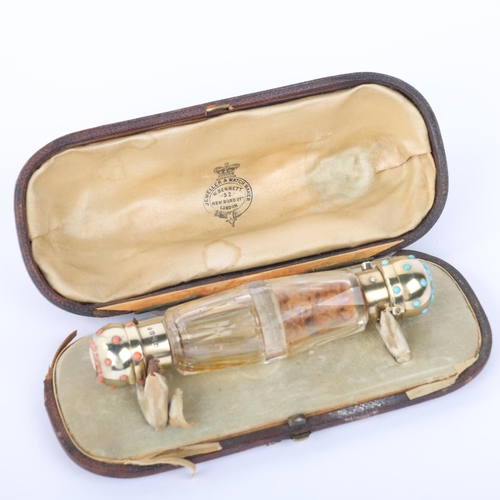 1756 - A Victorian silver-gilt mounted glass double-ended scent bottle, Thomas Johnson I, London 1866, the ... 