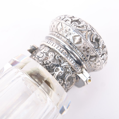 1757 - A Victorian silver-mounted glass double-ended scent bottle, George Brace, London 1885, the faceted g... 