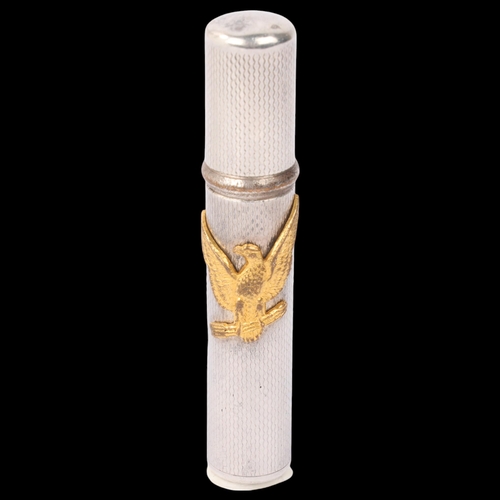 1761 - An American sterling silver-cased 'Eagle' pocket lighter, engine turned decoration, 8.5cm